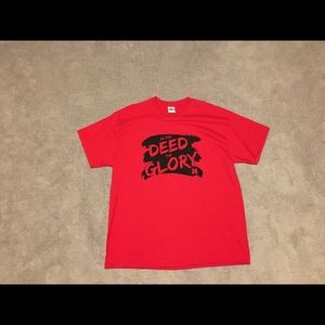 Unisex XL Huskers “In The Deed The Glory” T-Shirt